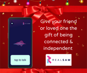 RealSAM Pocket on the left and "Give your friend or loved one the gift of being connected & independent" on the right. The RealSAM logo on the bottom. Everything is on a red Christmas background with a ribbon on top.
