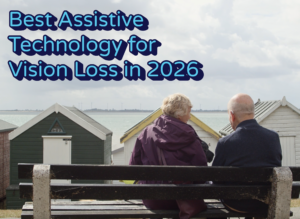 An elderly couple sits on a bench overlooking the sea, with the text "Best Assistive Technology for Vision Loss in 2026" floating above their heads. Peaceful and informative tone.